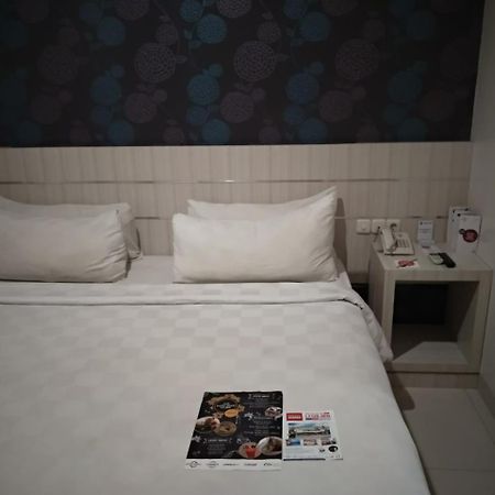 Cordela Hotel Medan Extérieur photo