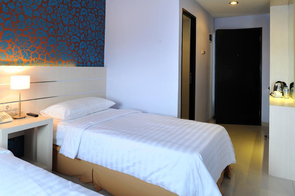 Cordela Hotel Medan Extérieur photo