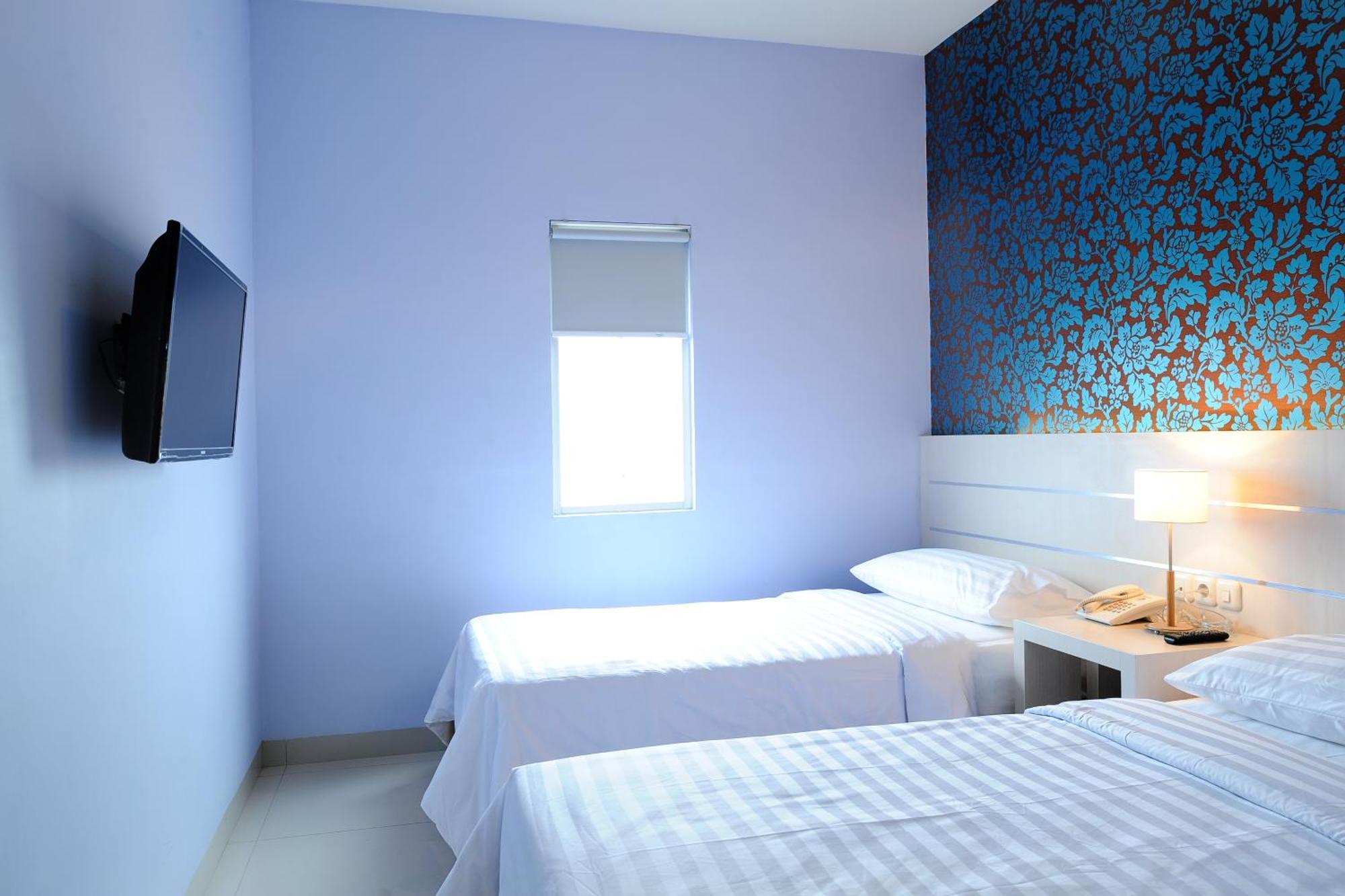 Cordela Hotel Medan Chambre photo